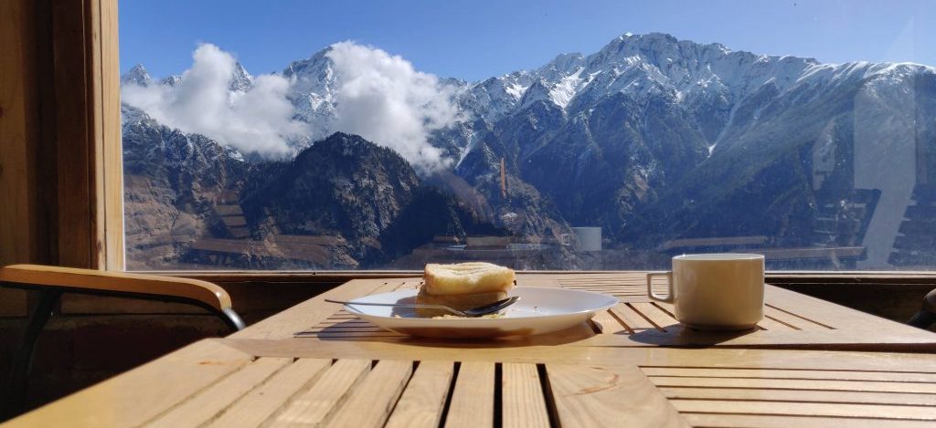 view from the dining room of Mountain Rover resort in Auli in the morning while eating breakfast and sipping tea